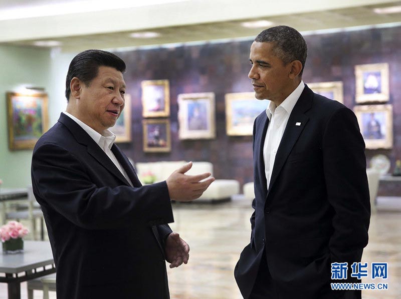 6月7日,中国国家主席习近平在美国加利福尼亚州安纳伯格庄园与美国总统奥巴马举行中美元首第一次会晤。这是会晤后,习近平同奥巴马交谈。新华社记者 兰红光 摄