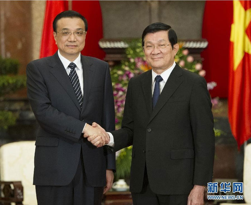10月14日,中国国务院总理李克强在河内会见越南国家主席张晋创。 新华社记者 黄敬文 摄