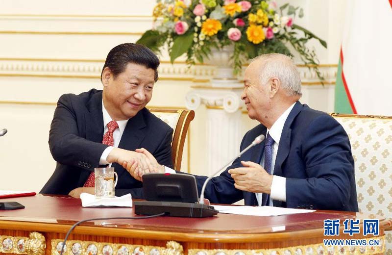 9月9日,國家主席習近平在塔什干同烏茲別克斯坦總統卡裡莫夫舉行會談。會談后,兩國元首共同會見記者。 新華社記者 鞠鵬 攝