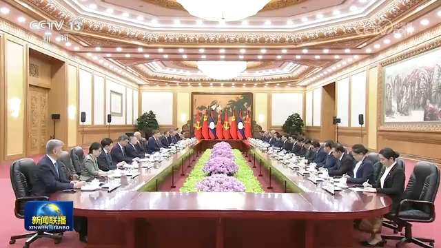 习近平同老挝人民革命党中央总书记、国家主席通伦举行会谈